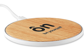 Wireless charger in ABS with bamboo look on the top.